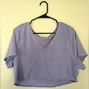 Urban Outfitters cropped lavender tee with crochet trimming. Size Medium